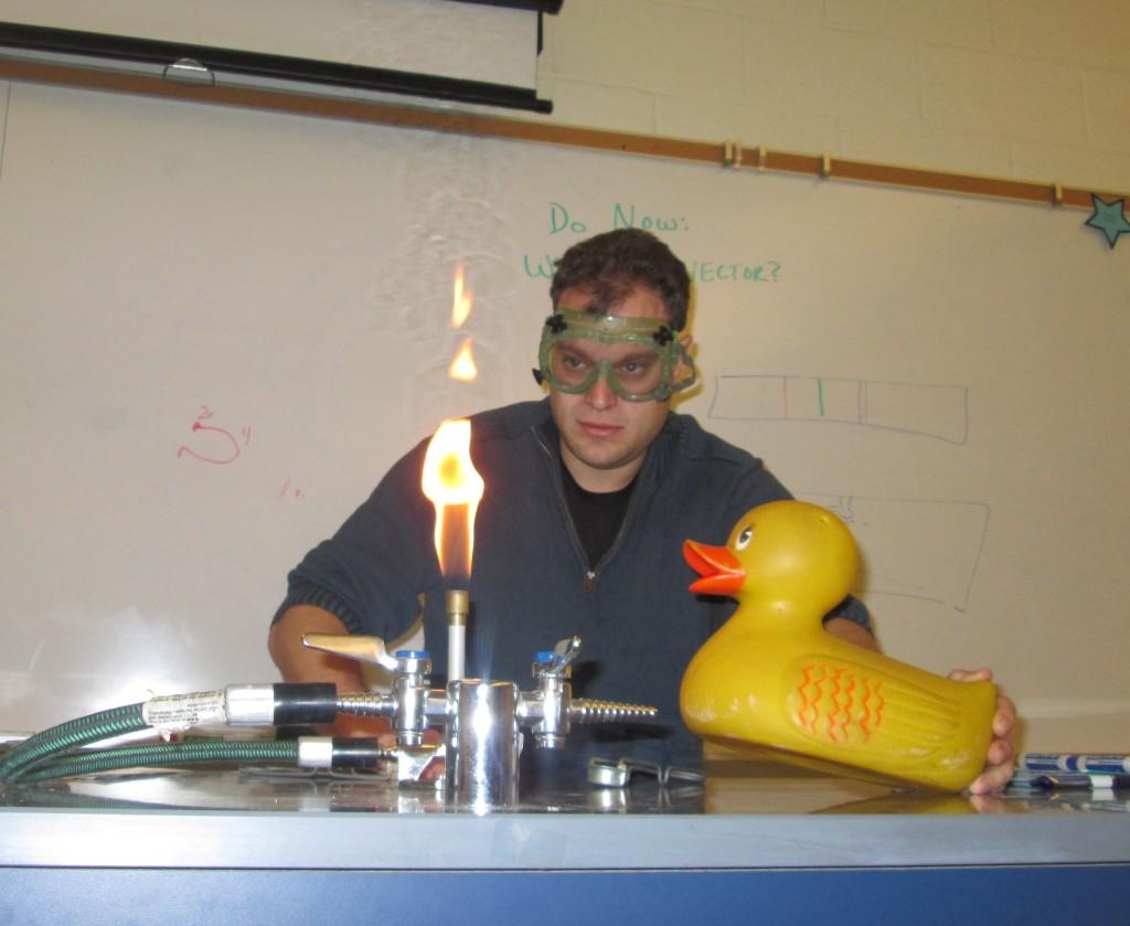 Mr. Goldman doing an experiment, trusty rubber duck in hand. 