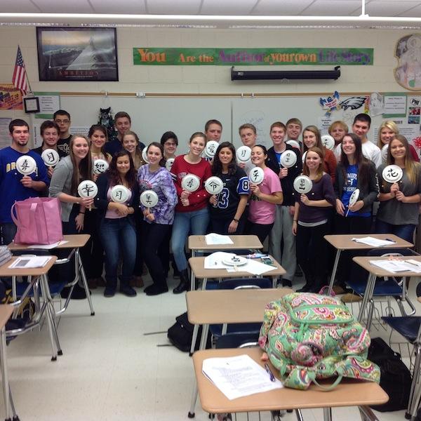Mrs. Perettis period 8 students hold their Chinese symbols.