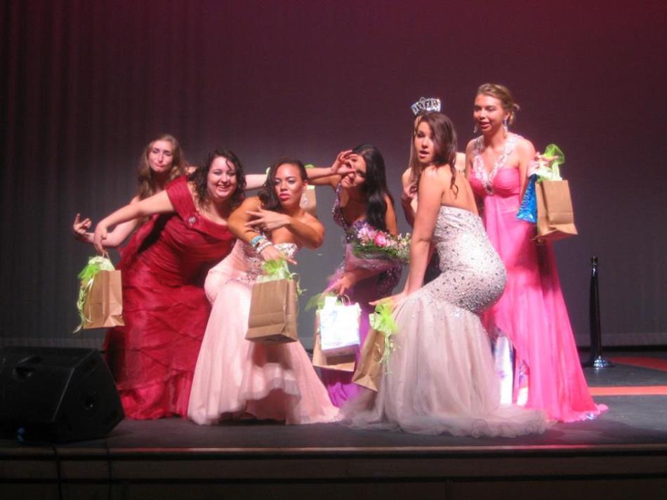 Contestants from the 2013 Miss Hammonton competition strike a funny pose after the pageant. This years event was cancelled because many contestant dropped out.