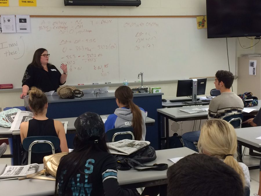 Editor of local newspaper speaks to journalism class