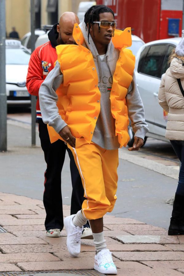 In easily his loudest outfit ever, Rocky stepped out in the Balenciaga inflatable vest (which is a womens piece by the way), a Gucci logo hoodie and custom Nike Air Force Ones