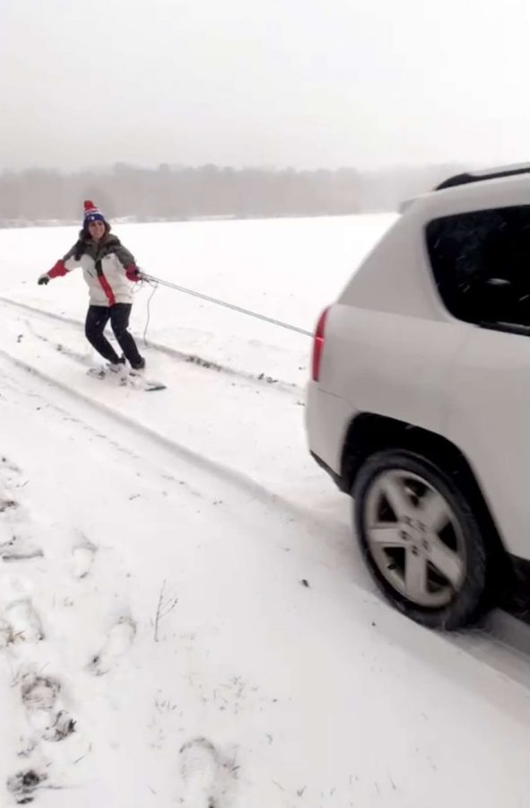 Mia Bullaro(senior) had decided to have a great snow day by shredding some snow hills.